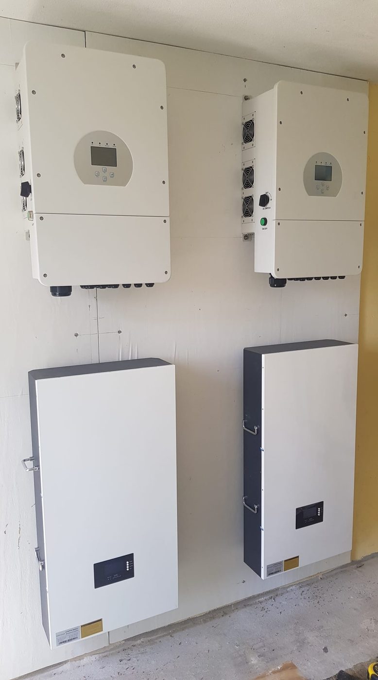 Power electronics and switchgear installed in a Comet Solar plant room