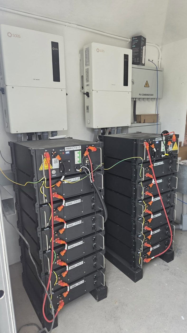 Solis inverters and LiFePO4 battery storage stacks installed in utility room